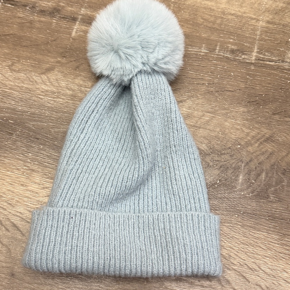 blue colored winter hat